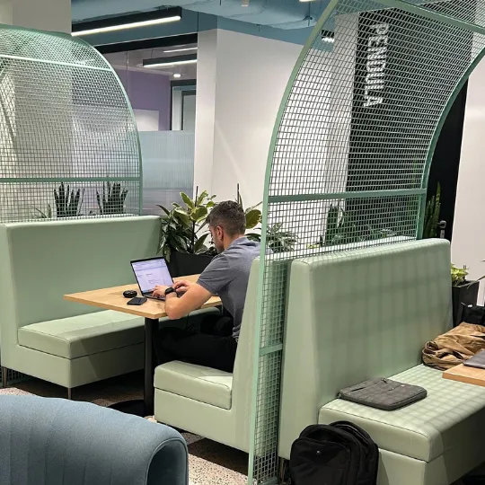 A picture of a man on a laptop